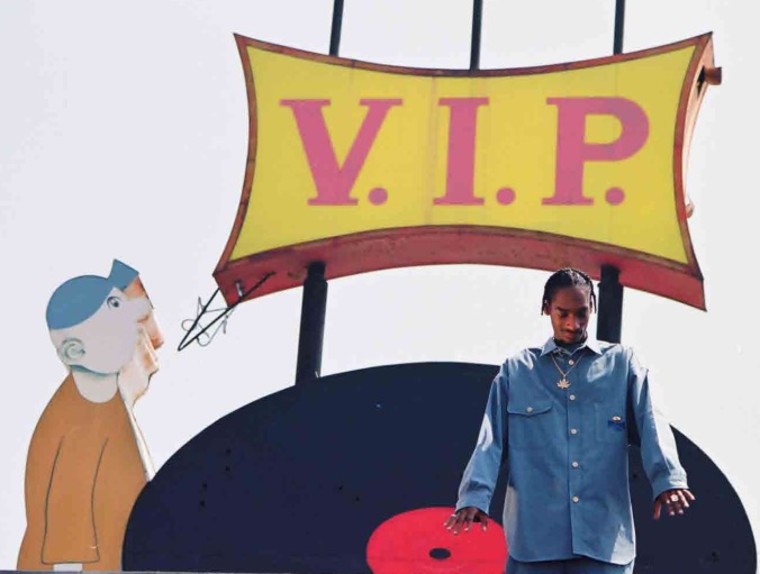 Rapper Snoop Dogg on top of V.I.P. Records.