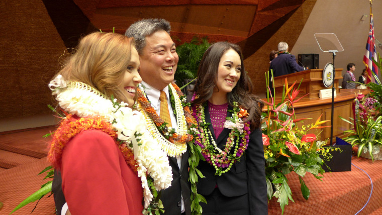 On the right, Hawaii state Rep. Beth Fukumoto Chang, a Republican, with Rep. Mark Takai, a Democrat, center. 