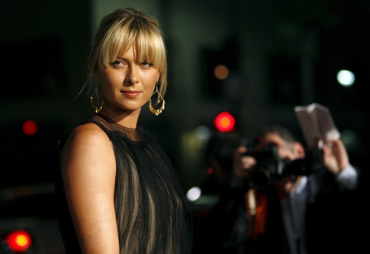 Image: File photo of Maria Sharapova posing at a premiere in Hollywood