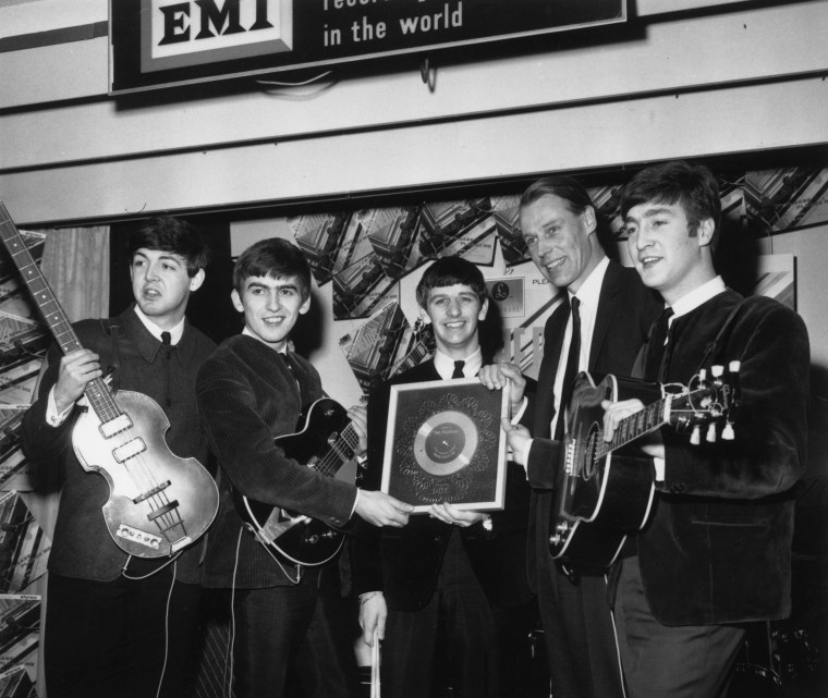 Image: The Beatles and George Martin in 1963
