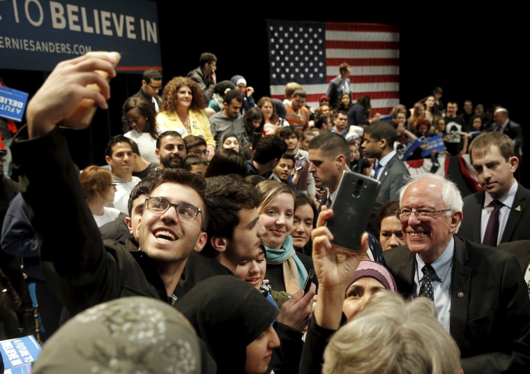 Image: U.S. Democratic presidential candidate Bernie Sanders greets supporters at a campaign rally in Dearborn