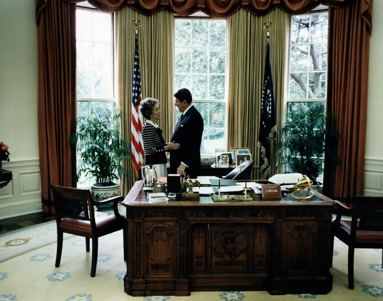 Nancy and Ronald Reagan in the Oval Office of the White House.