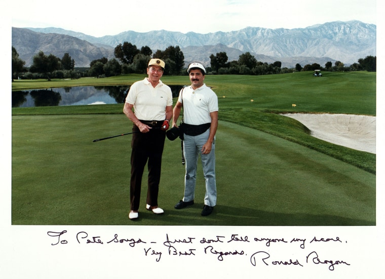 President Ronald Reagan and Official White House Photographer Pete Souza on the Annenberg golf course outside of Palm Springs, Calif.