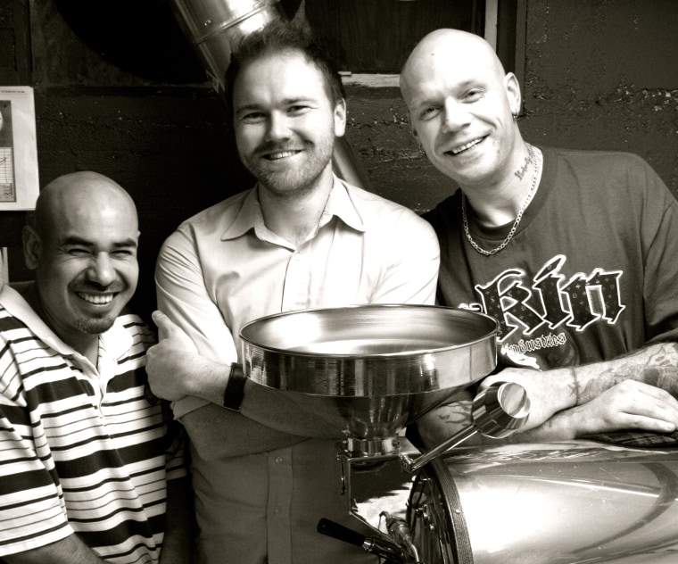 Image: Chris Hoke, middle, with Underground Coffee employees Jesse Garcia, left, and Zach Joy
