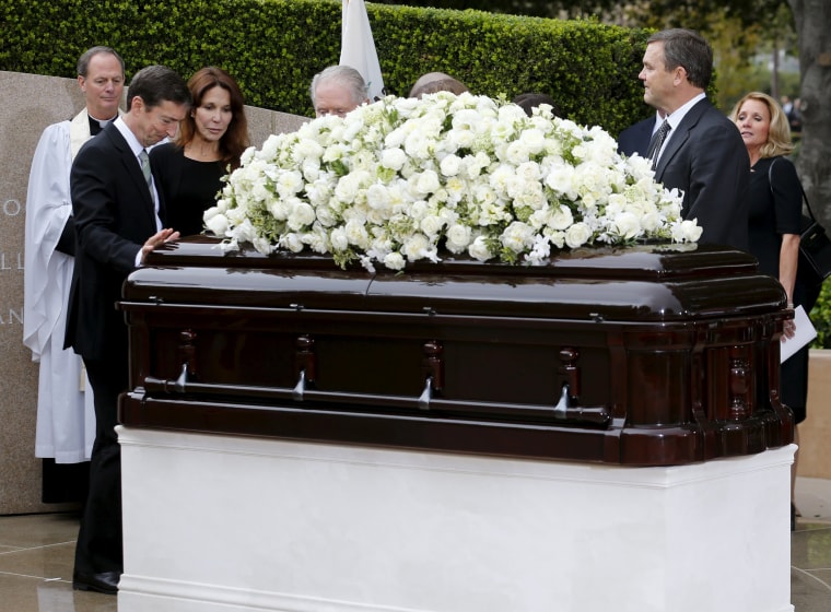 Image: Ron Reagan and his sister Patti Davis pay their respects to their mother former first lady Nancy Reagan during her funeral at the Ronald Reagan Presidential Library in Simi Valley, California