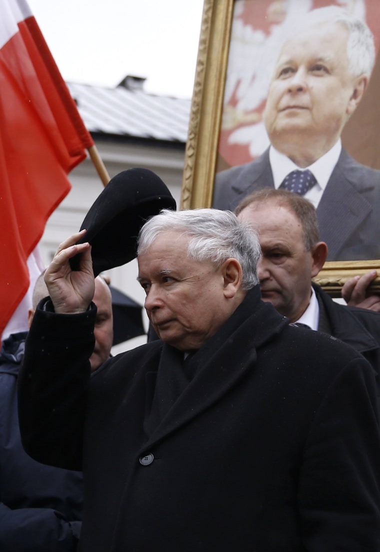 Image: Kaczynski, leader of ruling party Law and Justice Party (PiS), attends a remembrance ceremony for the 2010 plane crash that killed Jaroslaw's twin brother President  Kaczynski and 95 others in Smolensk, in front of the Presidential Palace in Warsaw