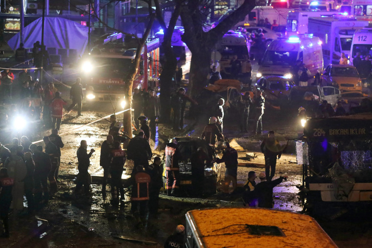 Image: Emergency workers work at the scene of an explosion