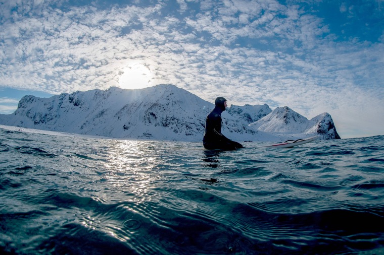 Arctic Surfers Brave Icy Waters Seeking Pristine Waves