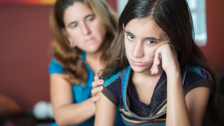 Teenager problems - Mother comforts her troubled teenage daughter; Shutterstock ID 210886192; PO: today.com