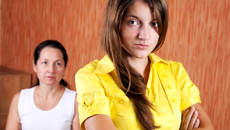 Mature mother and teenager daughter after quarrel at home; Shutterstock ID 92145997; PO: today.com