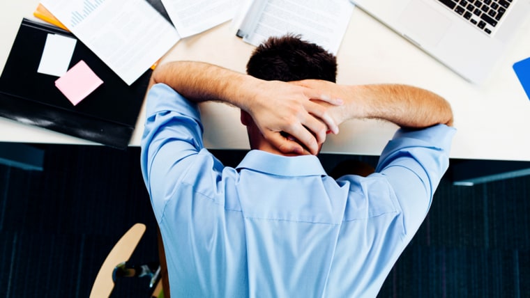 Businessman having stress in the office; Shutterstock ID 154308860; PO: today.com