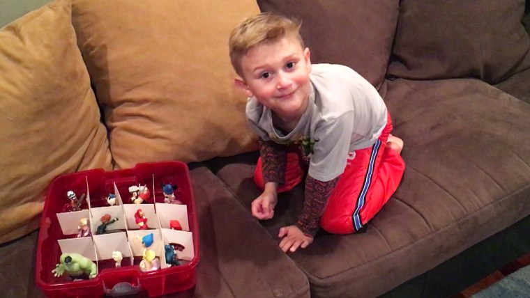 TODAY Parenting Team member Amanda Mushro keeps her son's toys organized with a Christmas ornament box.