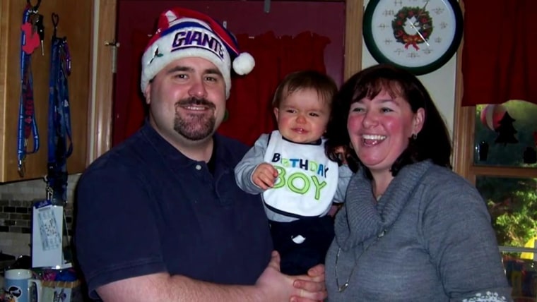Richard and Samantha Specht hold baby Rees before the tragedy.