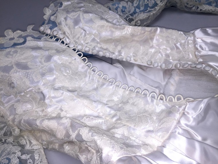 Wedding gown worn by two generations found after Illinois tornado