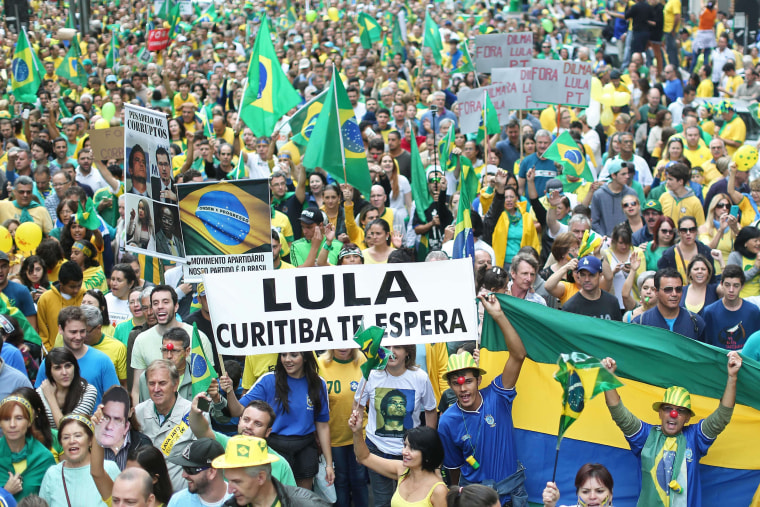 Image: Demonstrators take part in a protest rally in Santos Andrade square