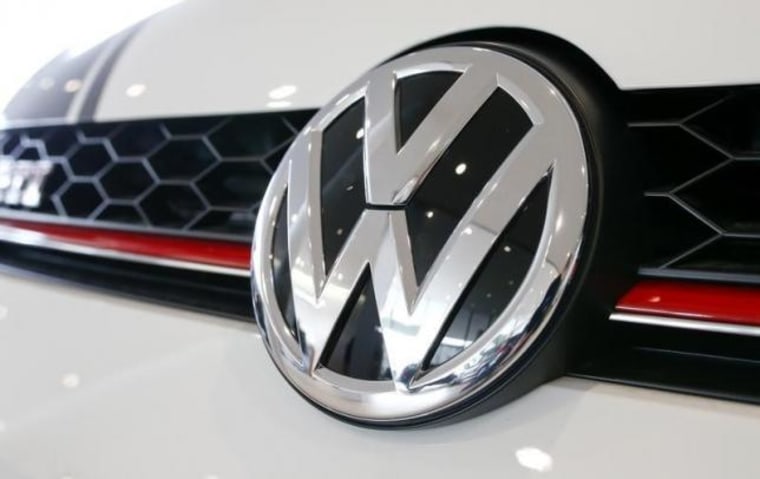 Logo of German carmaker Volkswagen is seen on a VW Golf GTI car at a showroom of AMAG in Duebendorf