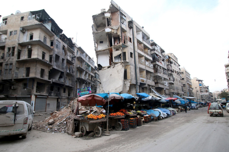 Image: Stalls are seen on a damaged street in Aleppo, Syria, on Feb. 10, 2016