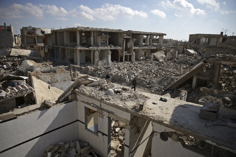 Image: Damaged buildings in Douma, Syria, on Feb. 9, 2016