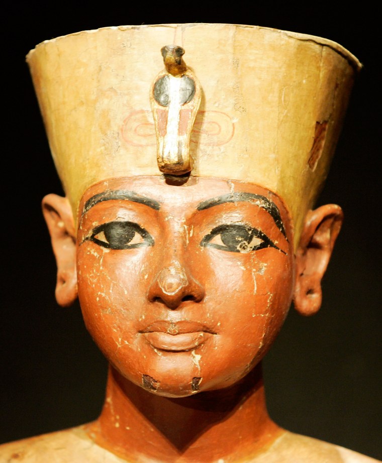 iMAGE: The mannequin head, carved of wood, of Tutankhamun is displayed