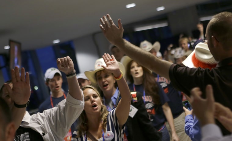 Texas delegates and Ron Paul supporters walk out of the Republican National Convention in Tampa, Florida, on Aug. 29, 2012. 