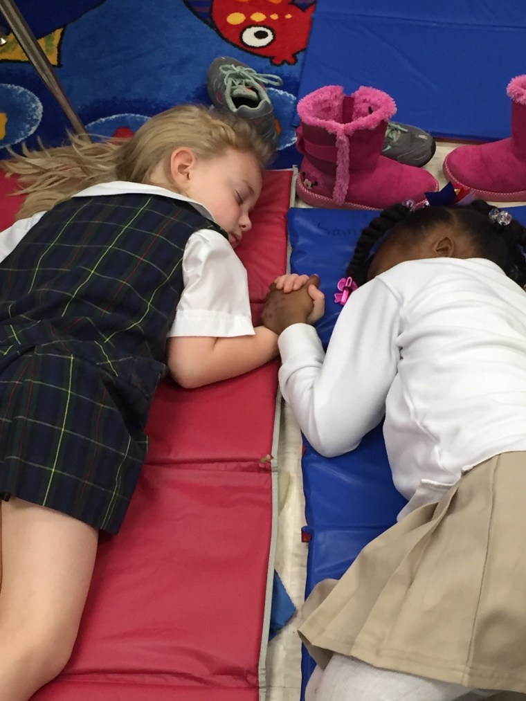 A photo of Lucy Harris Jackson and Samiyah Moore napping at school has gone viral