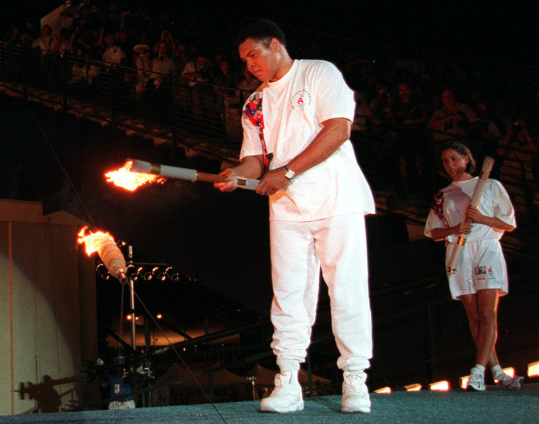 Image: Muhammad Ali lights the Olympic flame in Atlanta on July 19, 1996