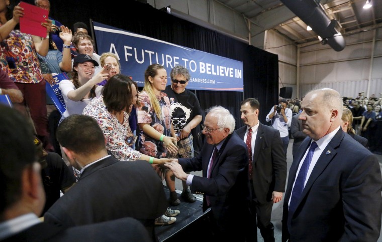 Image: Democratic U.S. presidential candidate Sanders greets supporters after speaking at a campaign rally in Phoenix