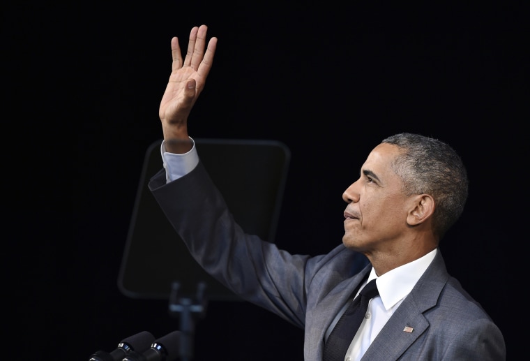 Image: Obama waves before delivering a speech at the Gran Teatro de la Habana