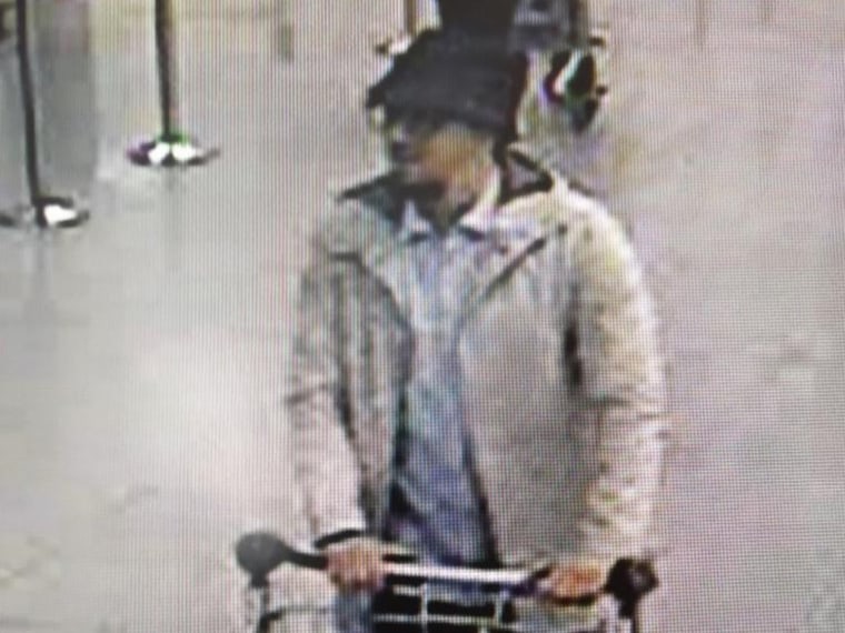 Image: A handout image released on March 22, 2016 by the Belgian Federal Police shows a screen grab of the airport CCTV camera showing a suspect