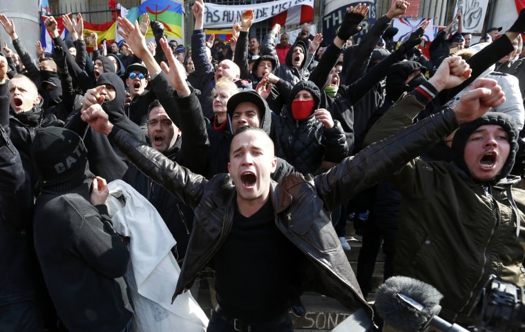 Image: Right-wing demonstrators protest against wave of terrorism in frront of the old stock exchange in Brussels