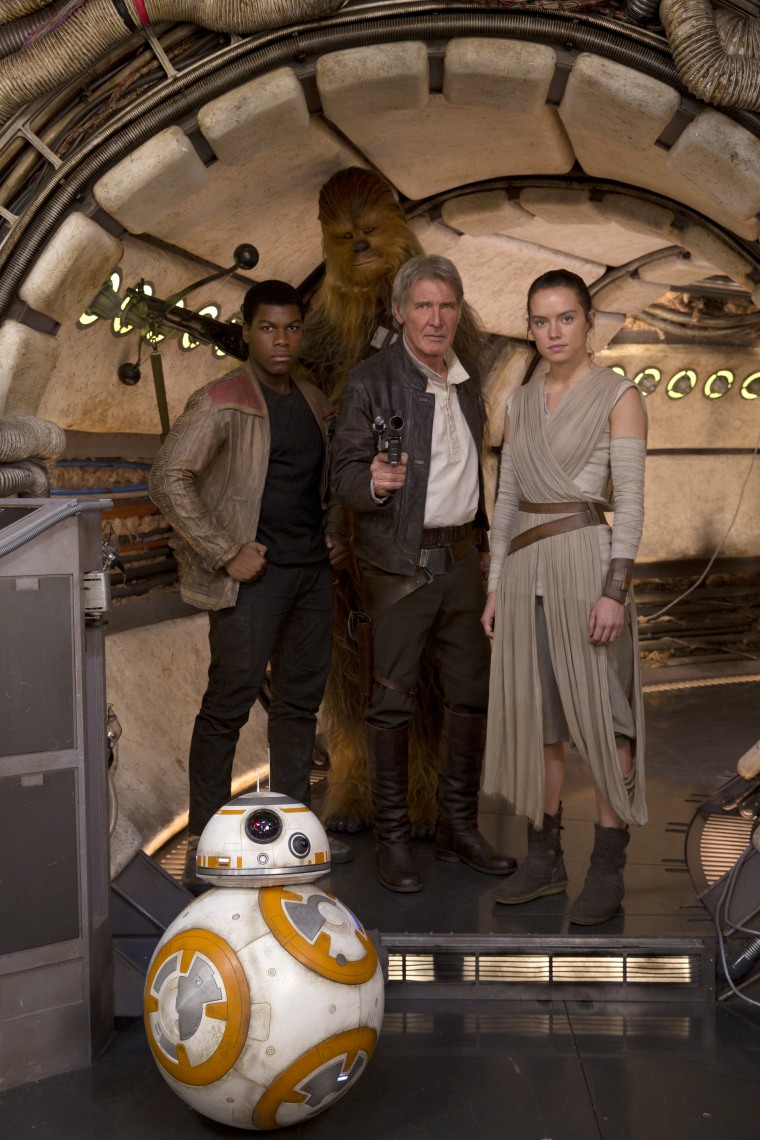 Harrison Ford, center, is auctioning off Han Solo's jacket from "Star Wars: The Force Awakens" for charity.