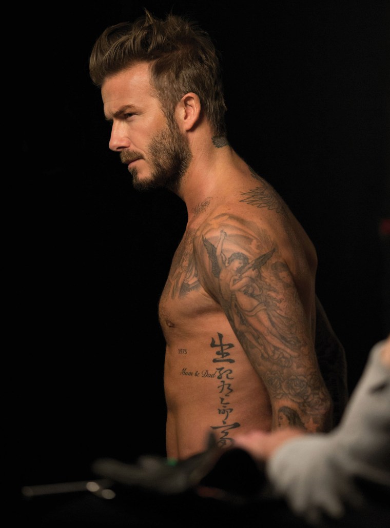 David Beckham goes shirtless in behind the scenes shots from his new fragrance campaign