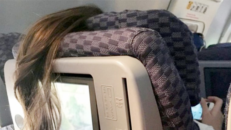 Congrats to the ponytailed young woman in seat 22B. You've invented a whole new way to be awful at 35,000 feet.