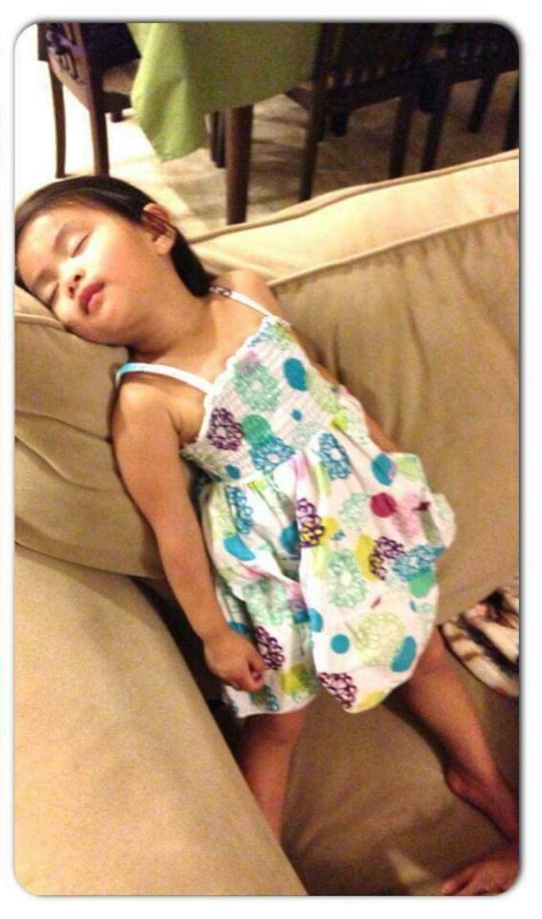 Girl sleeping while standing