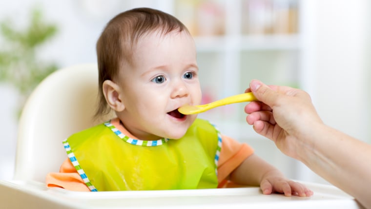 Baby eating cereal