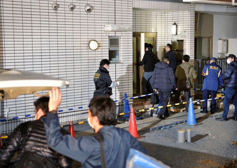 Image: Police at apartment of abduction suspect in Tokyo