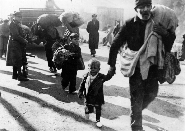 Refugees from the Spanish Civil War cross into France at Le Perthus.