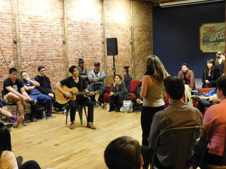 Performers at We Own The 8th, an Asian-American arts collective that meets monthly at The Good Company in Los Angeles.