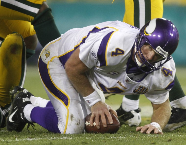 Image: Minnesota Vikings quarterback Brett Favre is sacked by the Packers defense in Green Bay
