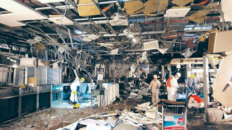 Image: Damage seen inside the departure terminal following the March 22, 2016 bombing at Zaventem Airport, in these photos made available to Reuters by the Belgian newspaper Het Nieuwsblad