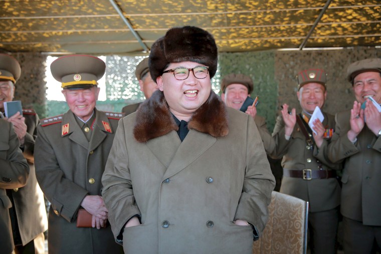 Image: File photo of North Korean leader Kim Jong Un attending a demonstration of a new large-caliber multiple rocket launching system at an unknown location