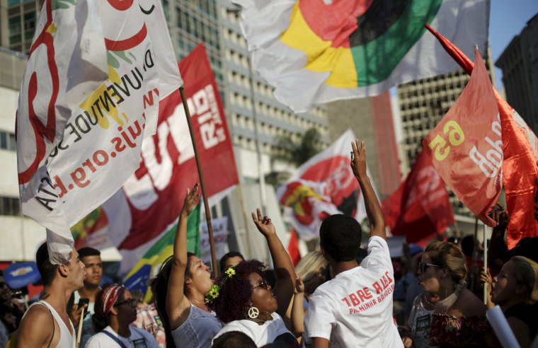 Image: People attend a protest against impeachment proceedings against Brazil's President Dilma Rousseff in Rio de Janeiro