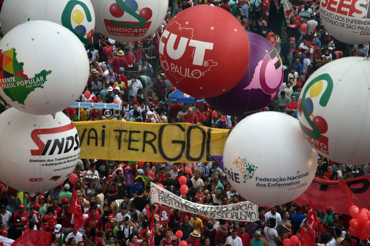 Image: Unionists and Worker's Party (PT) supporters demonstrate in Sao Paulo