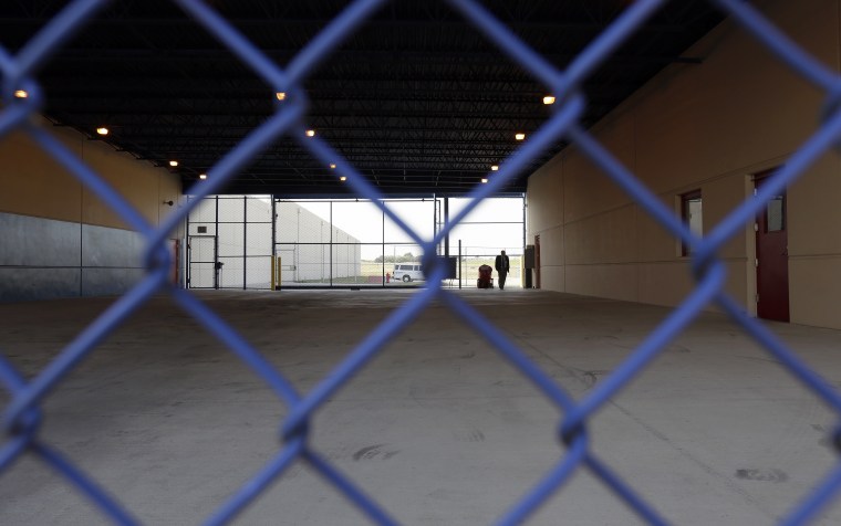 A secured entryway is seen at the Karnes County Residential Center in Karnes City, Texas on July 31, 2014. Federal officials gave a tour of the South Texas immigration detention facility that has been retooled to house adults with children who have been apprehended at the border.