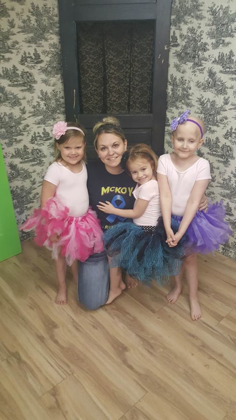 Photographer Lora Scantling with the three girls she helped bring togather