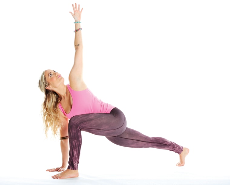 Kathryn Budig demonstrates yoga poses from her new book