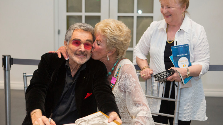 Burt Reynolds and Ann Lawlor Scurry, who were high-school sweethearts, reunite at the Palm Beach Book Festival on April 2, 2016.