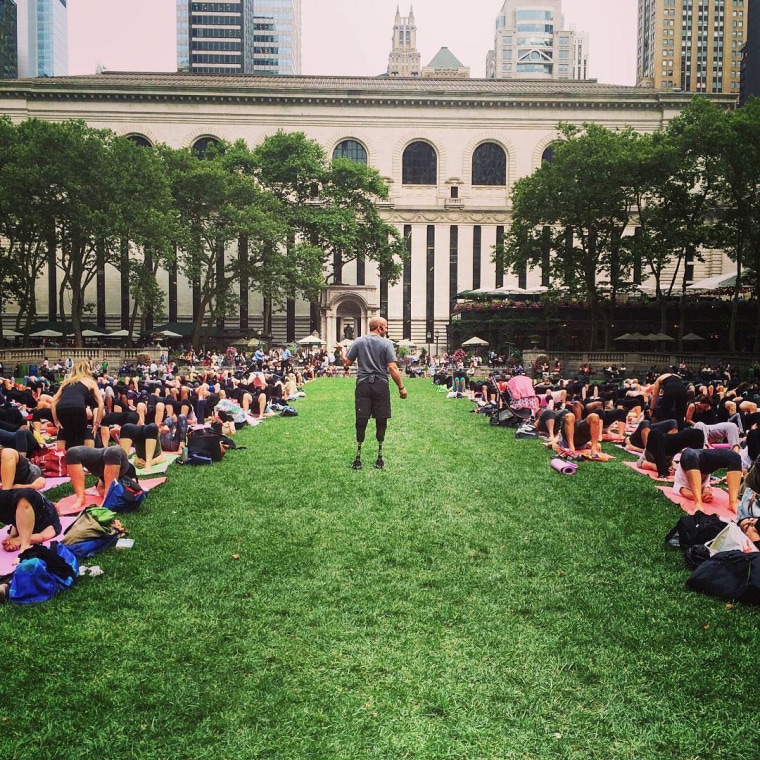 Dan Nevins teaching yoga in Bryant Park.