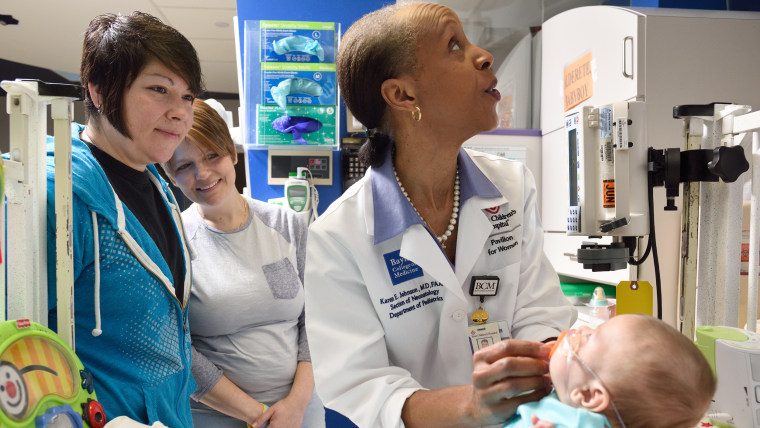 Dr. Karen Johnson with patients at Texas Children's Hospital.