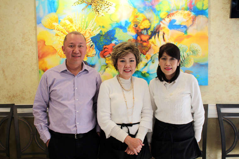 Tri Tran, Lan Khai Vo, and Suong Truong at Song Long Restaurant.